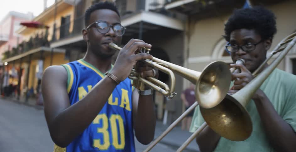 Musicians play in a city street