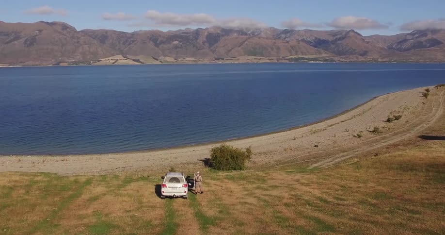 A van parked in the grass
