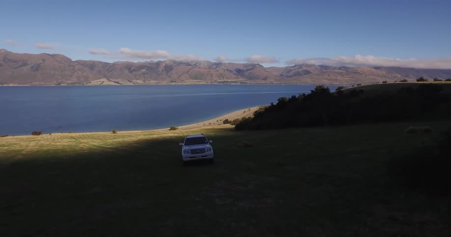Man Fly Fishing At Lake Hawea