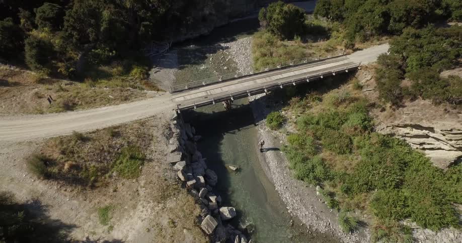 A bridge crossing a stream
