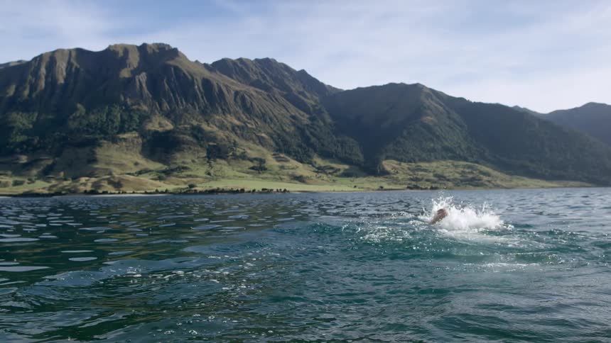 Man Swimming In Lake Hawea