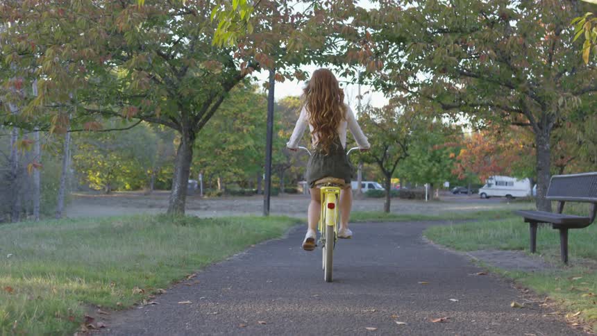 Girl riding her bike