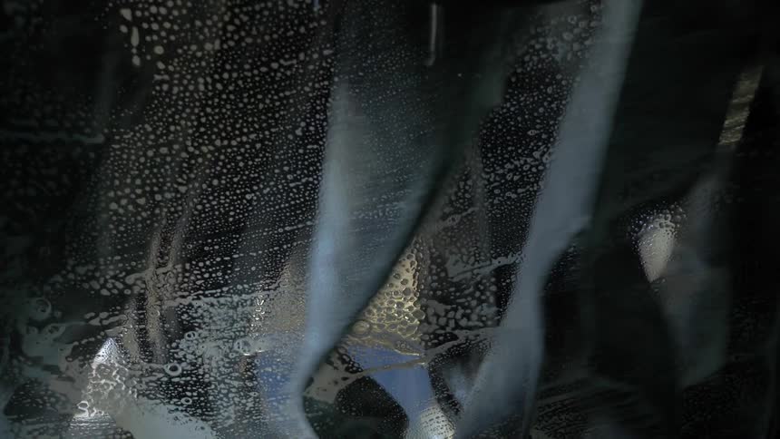 Automated wash rags wash car at car wash
