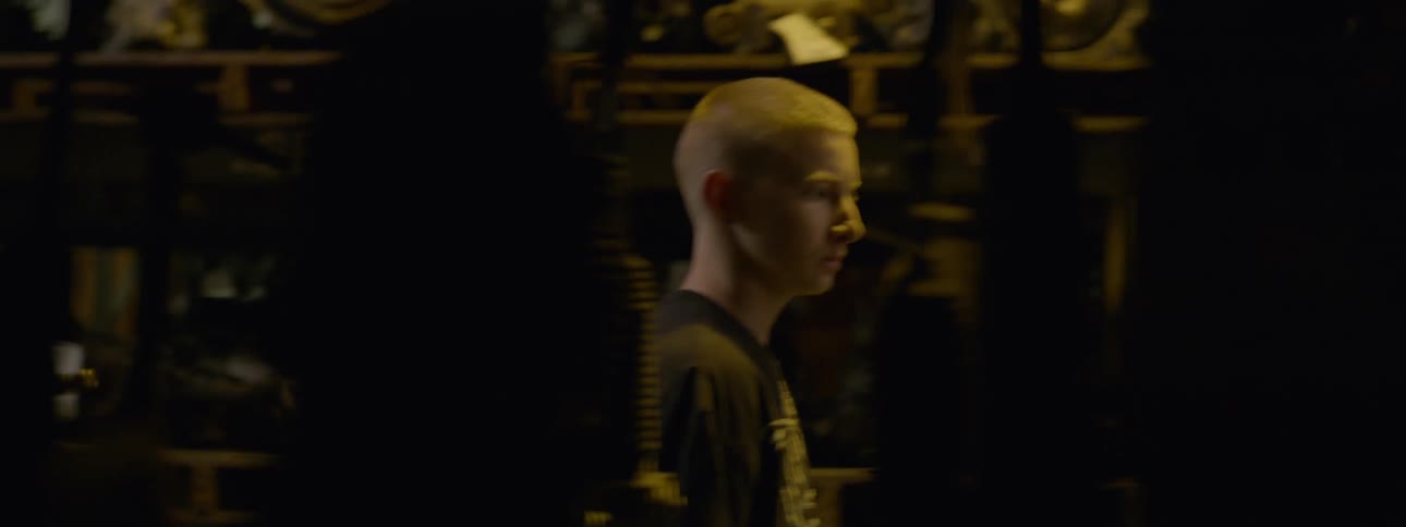 Teen walking through a factory