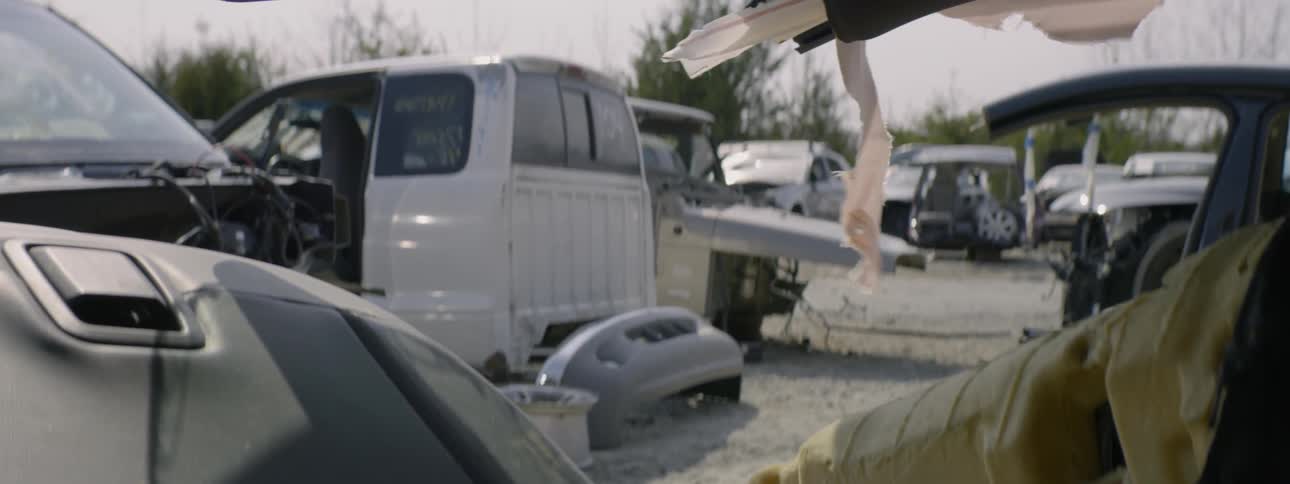 A junkyard full of broken vehicles