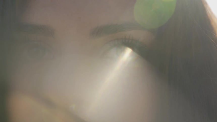 A woman outside staring
