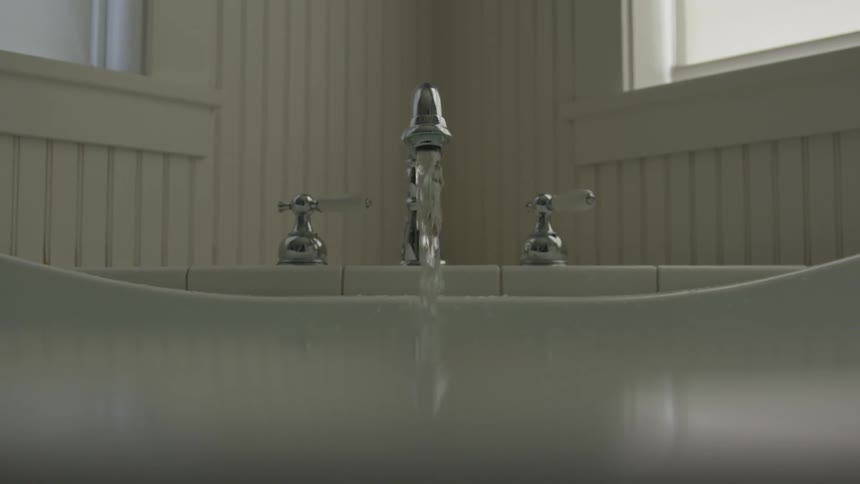 Water is running out of a faucet