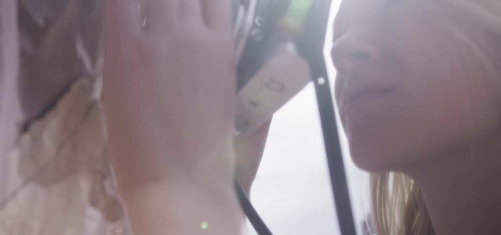 A female photographer taking photos