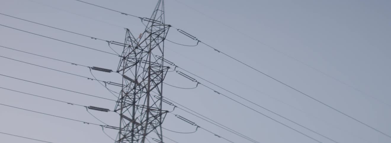 Electric power lines with the sky in the background