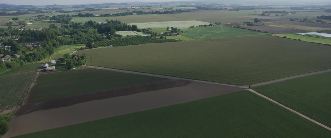 An aerial view of fields on a rural farm