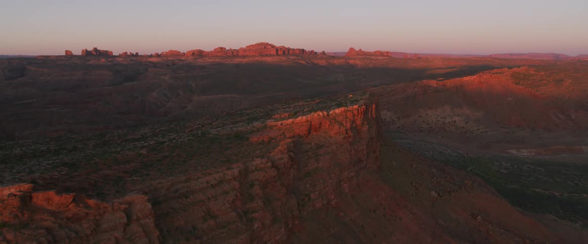 Aerial shot of a canyon at dawn