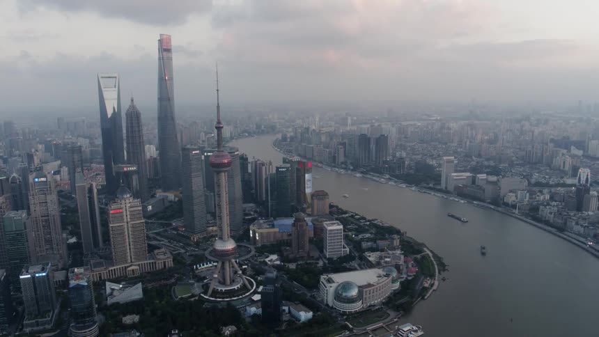 Dark clouds hang over the Shanghai Pudong skyline