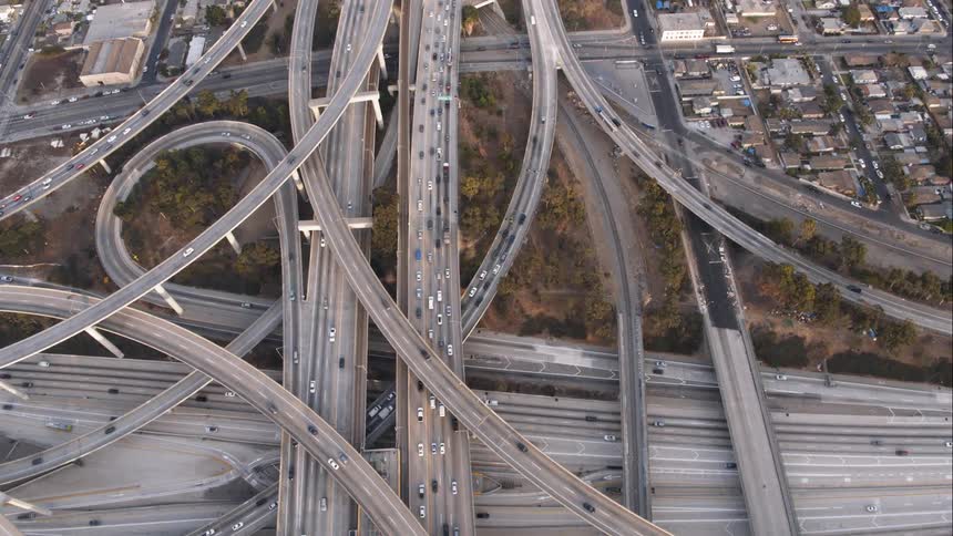 Aerial view of multiple interstate interchanges in a metropolitan area