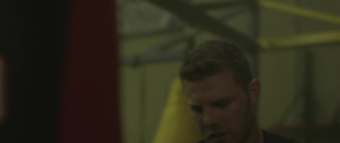 A man boxing in a gym