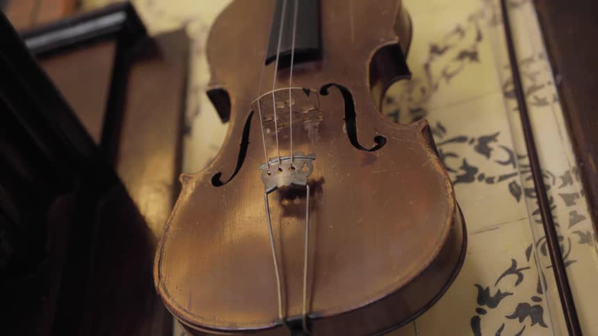 Camera shows an old violin