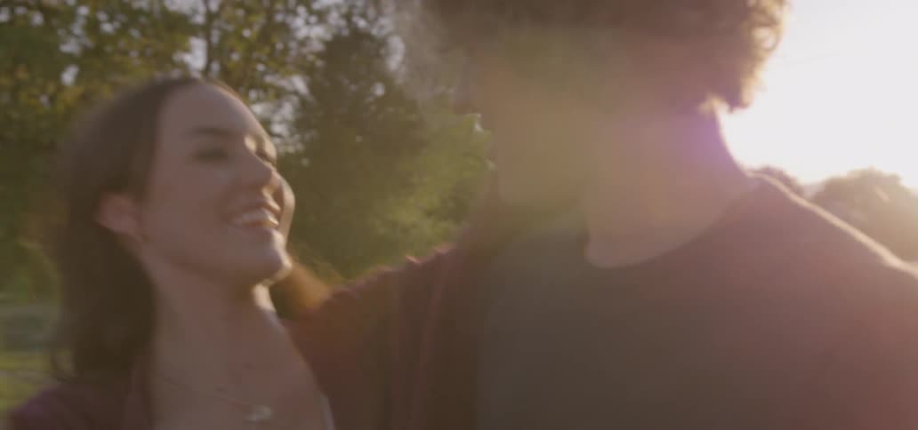 A couple dances by the road