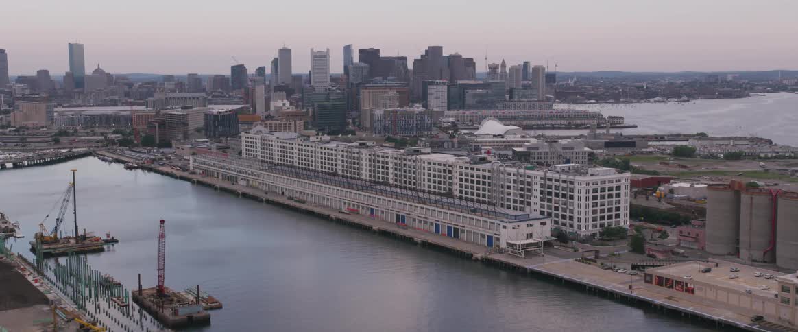 The docks are full of containers near the city