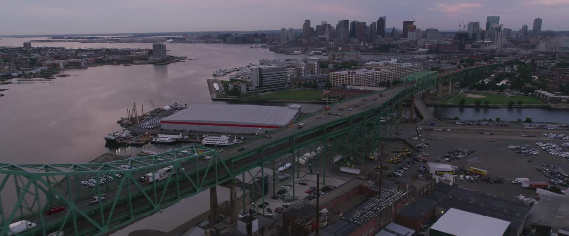 Aerial view of tobin bridge and boston skyline at dusk