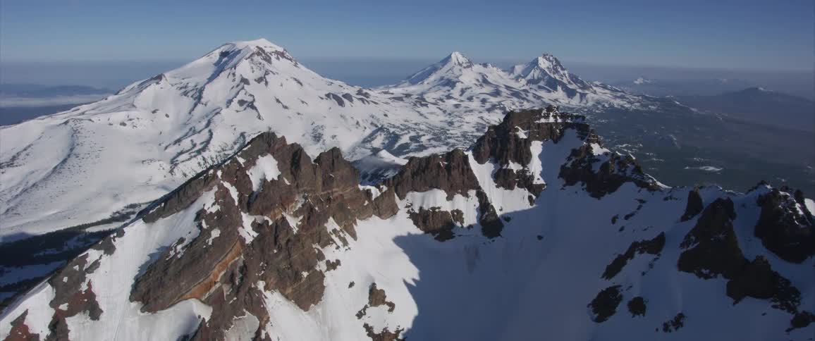 Mountains with snow with the sky in the background