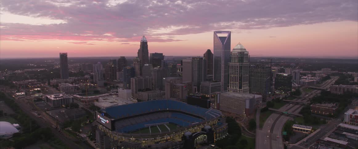 A cloudy sky hangs over a large metropolitan area