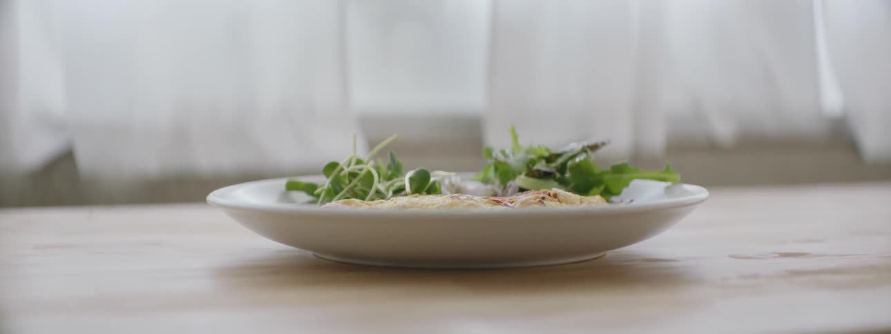A plate of food sitting on a table