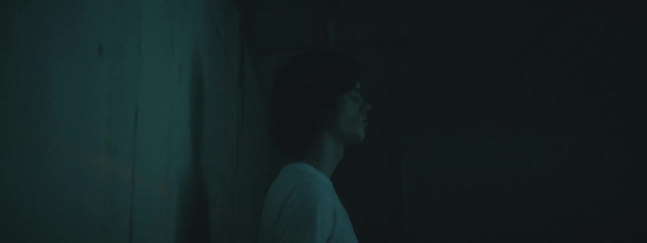 A young man is scanned with laser beams