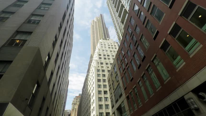 A city is shown during the day
