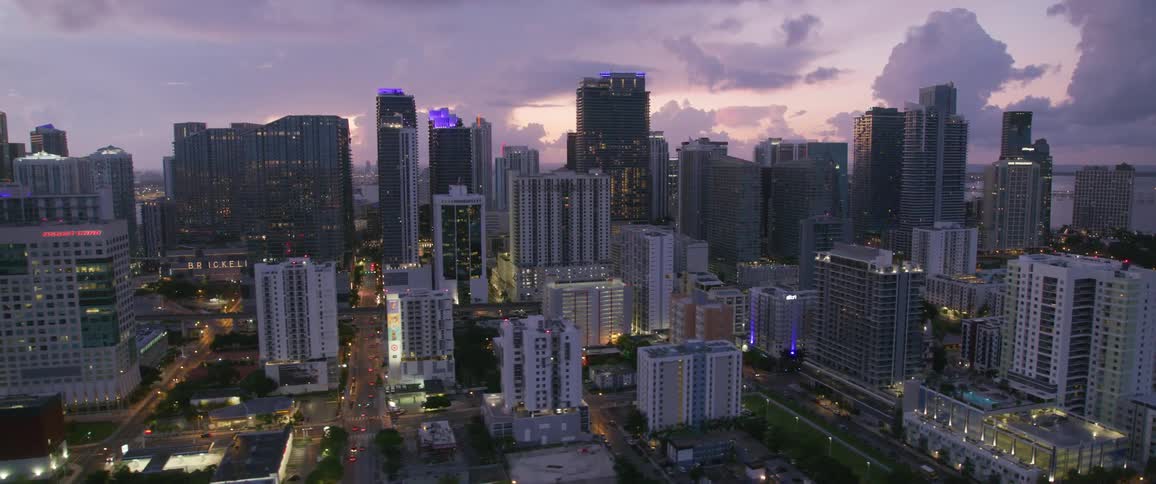 A cityscape with many buildings and skyscrapers