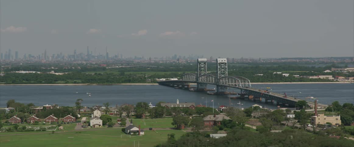 Bridge over ocean connects city and neighborhood