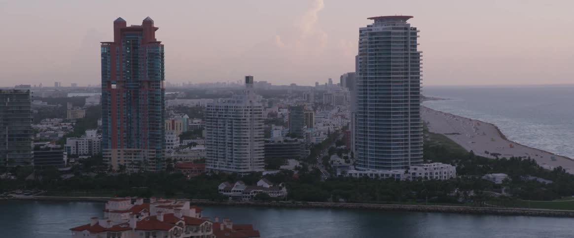 Aerial shot of a city skyline at dusk