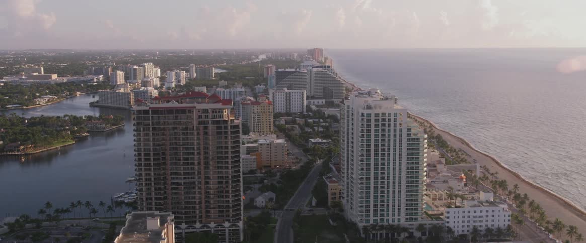 A large city on the coast surrounded by water