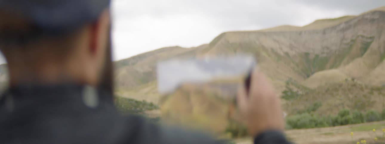 Man paints mountain
