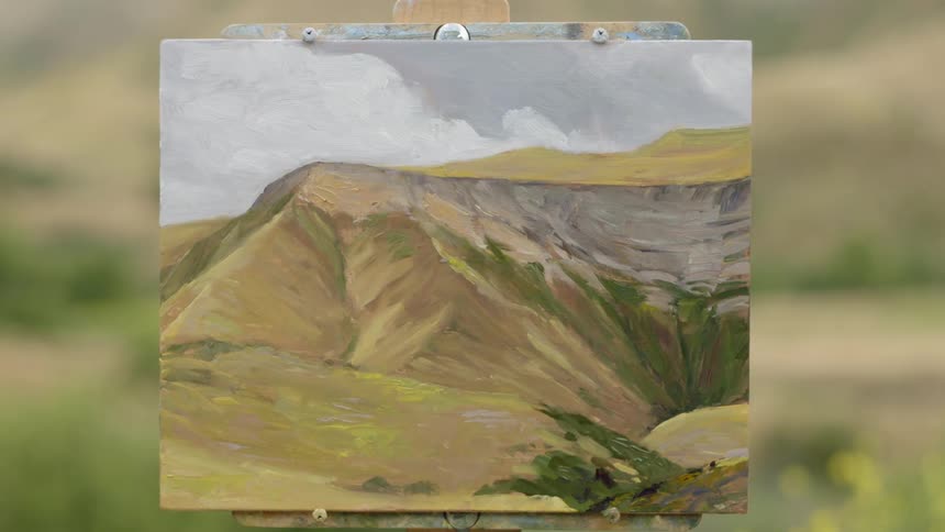 A painting is displayed outdoors