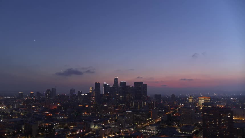 Aerial view of a city at dusk