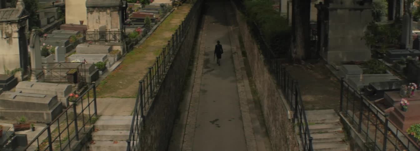 A man walking down a dark alley