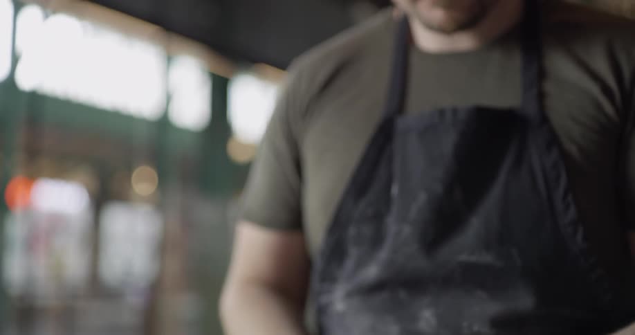 A man prepares fresh pasta
