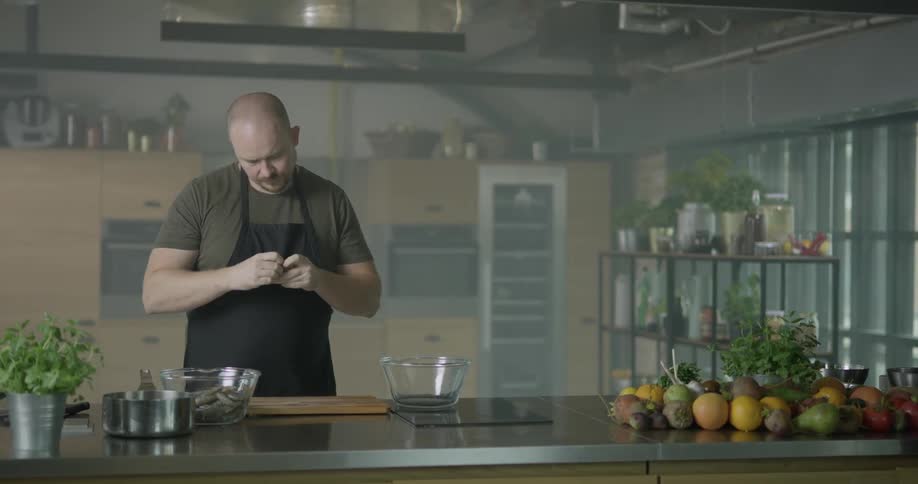 A chef prepares shrimp