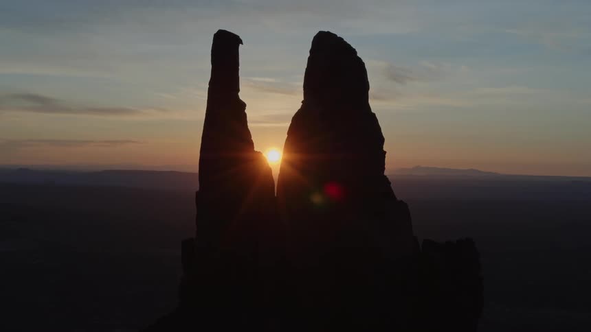 The sun is setting in the horizon