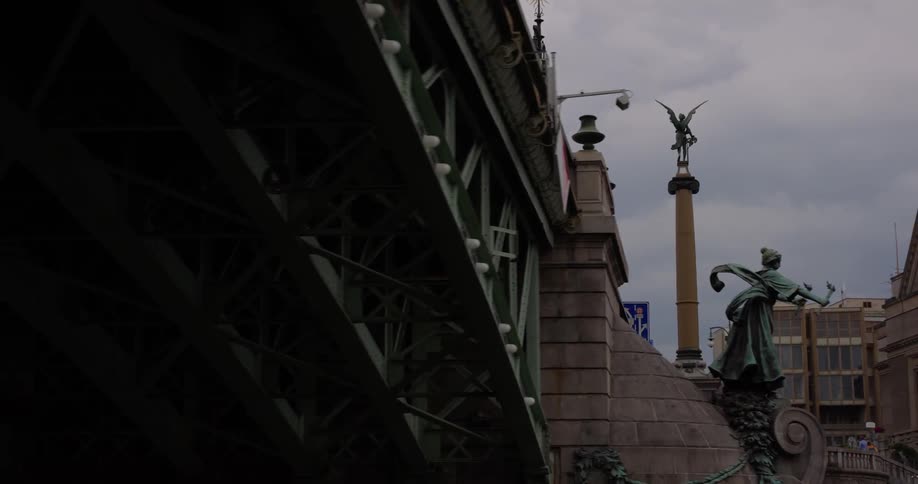 Moving under a bridge in a city