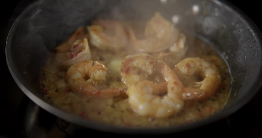Shrimp frying in a pan