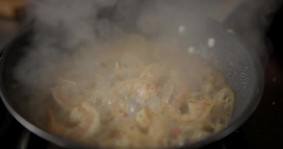 Shrimp being cooked on a frying pan