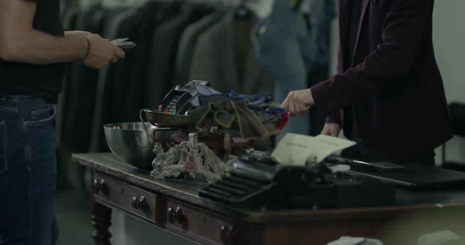 A person buying goods with a credit card