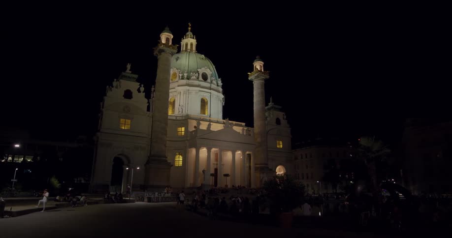 An illuminated church building during the night