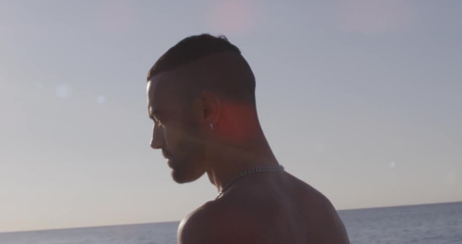 Man walks along beach