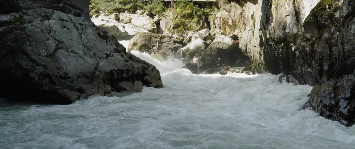 A shot of a waterfall on a cliff
