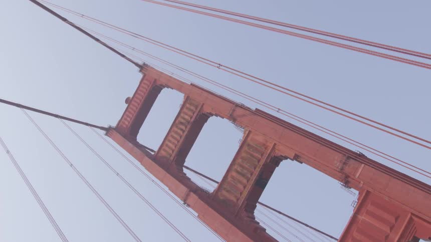 The camera moves across the golden gate bridge