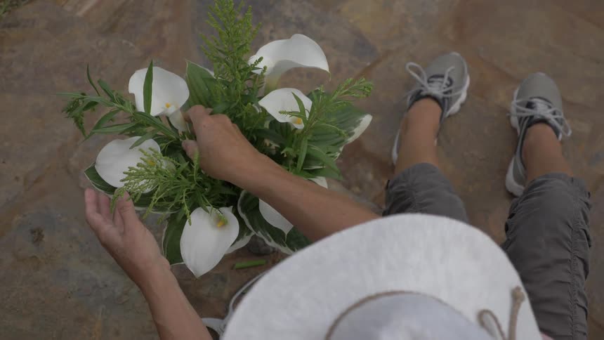 Woman arranging flowers