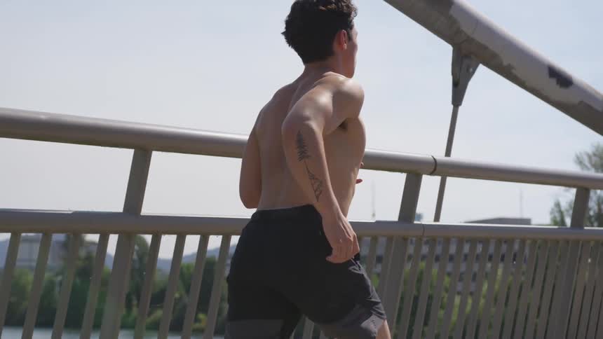 Man running on a bridge