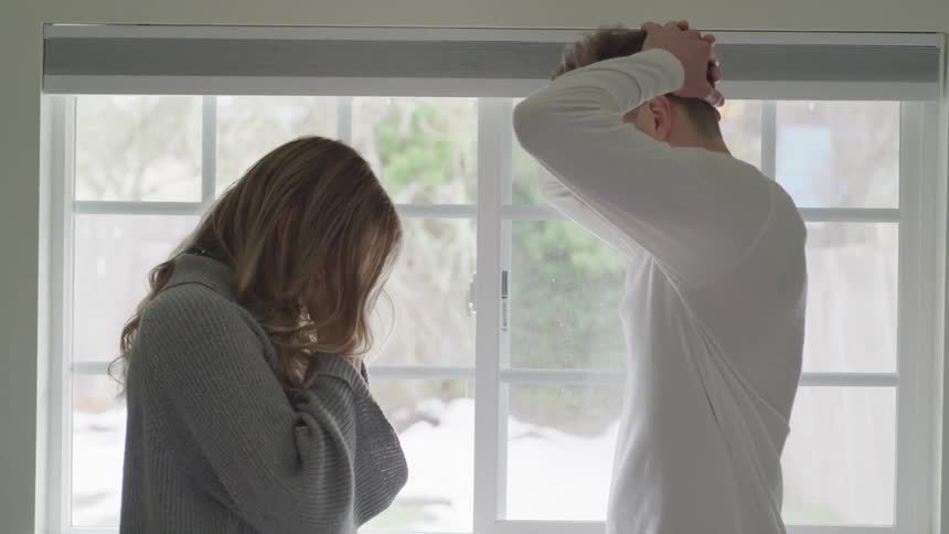 A couple looks frustrated