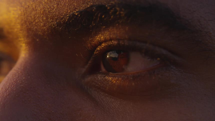 Person looks toward sun